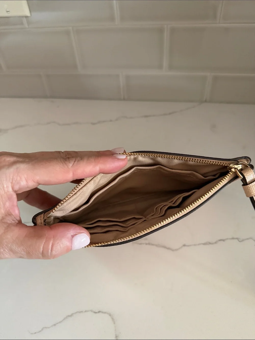 Coach Tan Pebbled Leather Wristlet with Gold Logo